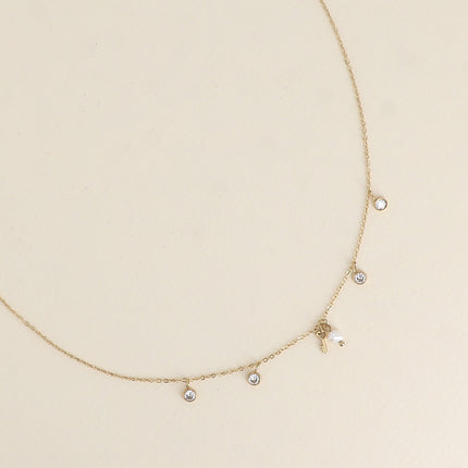 Collier - 4 cristaux, perle d'eau douce et clé coeur