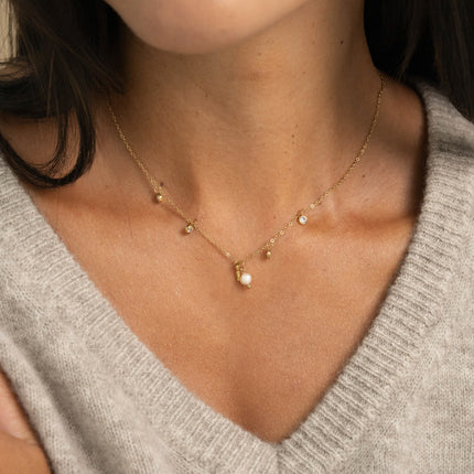 Collier - 4 cristaux, perle d'eau douce et clé coeur