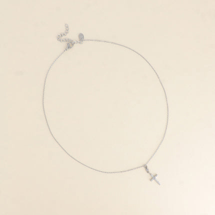 Collier - croix religieuse et d'un cristal
