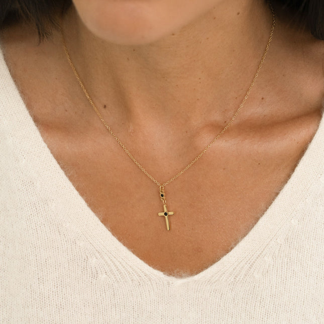 Collier - croix religieuse et d'un cristal