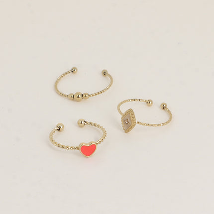 Set de 3 bagues Manguy - 3 boules, coeur émaillé et losange émaillé serti d'un oxyde de zirconium