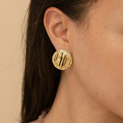 Stud earrings - textured and openwork oval piece