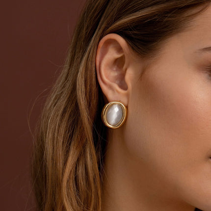 Siris stud earrings - oval cut cat's eye style stone
