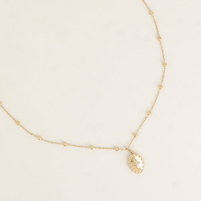 Collier - chaîne avec boules, ovale avec étoile et cristal