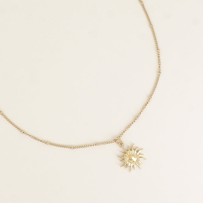 Collier - chaîne avec petites boules et soleil