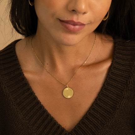 Necklace - round pendant with an engraved eclipse