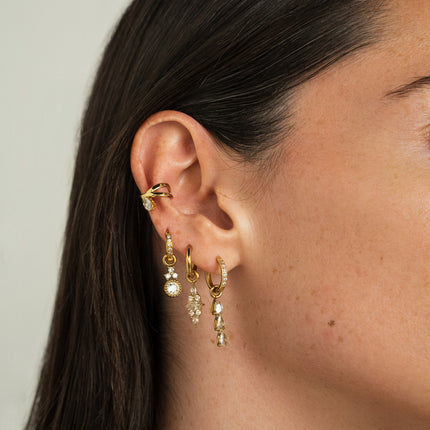 Earcuffs - intertwining of two rings and an oval crystal