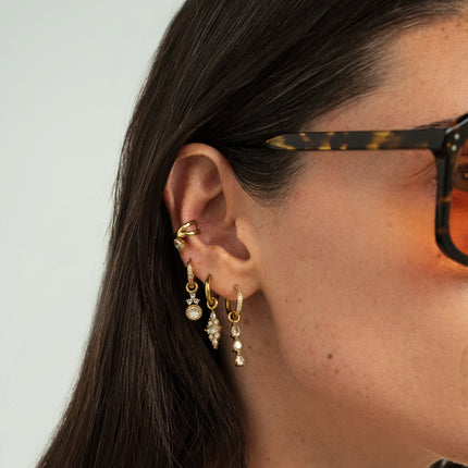 Earcuffs - intertwining of two rings and an oval crystal
