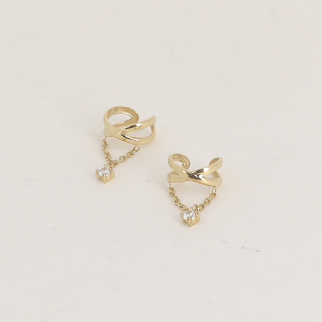 Earcuffs - deux anneaux croisés et un cristal sur une chaîne pendante
