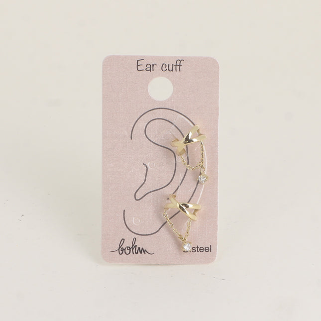 Earcuffs - deux anneaux croisés et un cristal sur une chaîne pendante