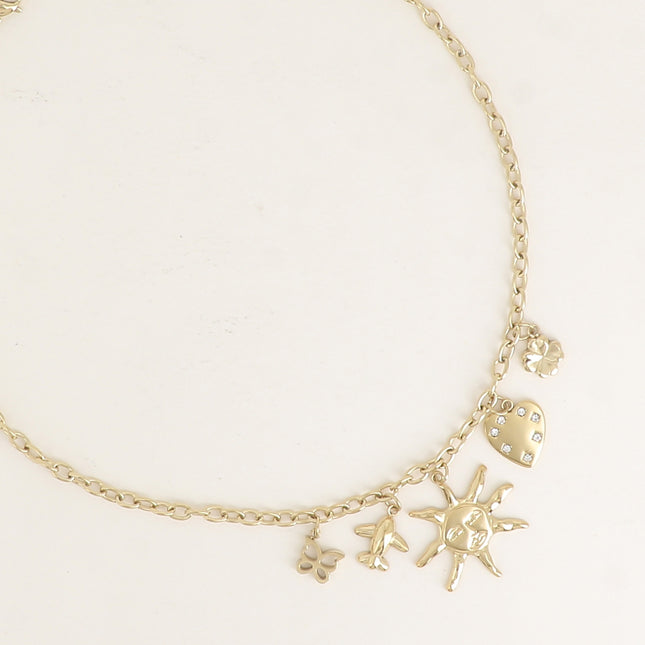 Collier - papillon, avion, soleil, coeur avec oxydes de zirconium et trèfle