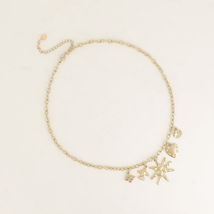 Collier - papillon, avion, soleil, coeur avec oxydes de zirconium et trèfle