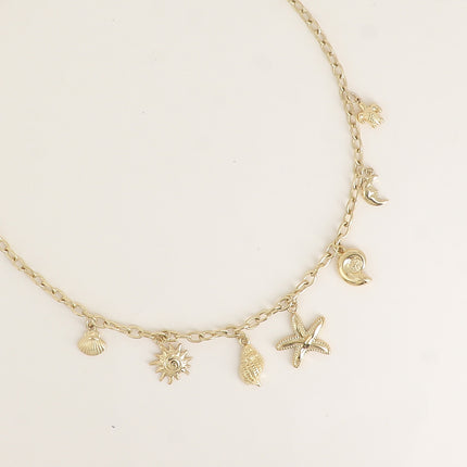 Collier - breloques (étoile de mer, soleil, lune, coquillages, tortue)