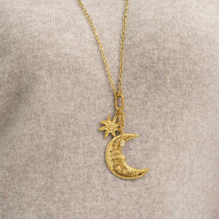 Sautoir - croissant de lune, soleil et cristal en forme de goutte