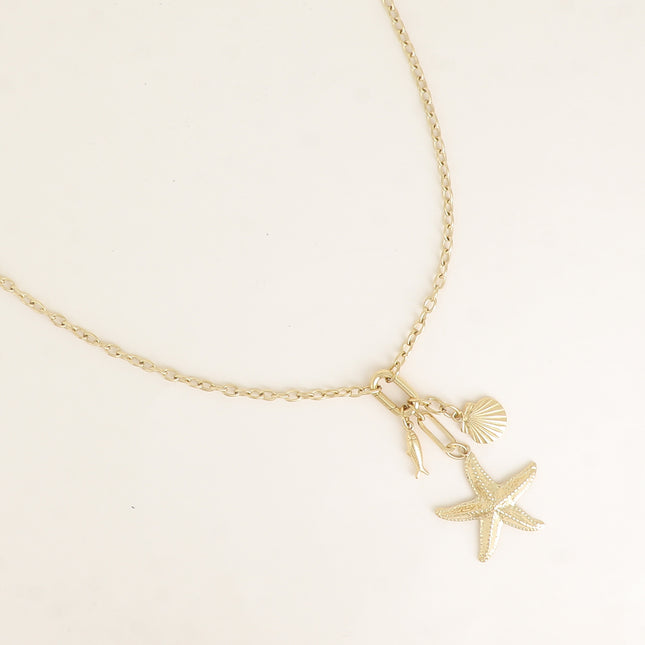 Collier - anneau ovale et 3 pendentifs (coquillage, poisson et étoile de mer)