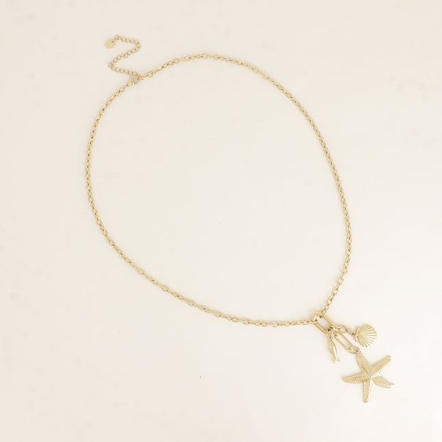 Collier - anneau ovale et 3 pendentifs (coquillage, poisson et étoile de mer)