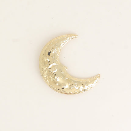 Broche - croissant de lune et de petits motifs (oeil, fleurs, points) gravés