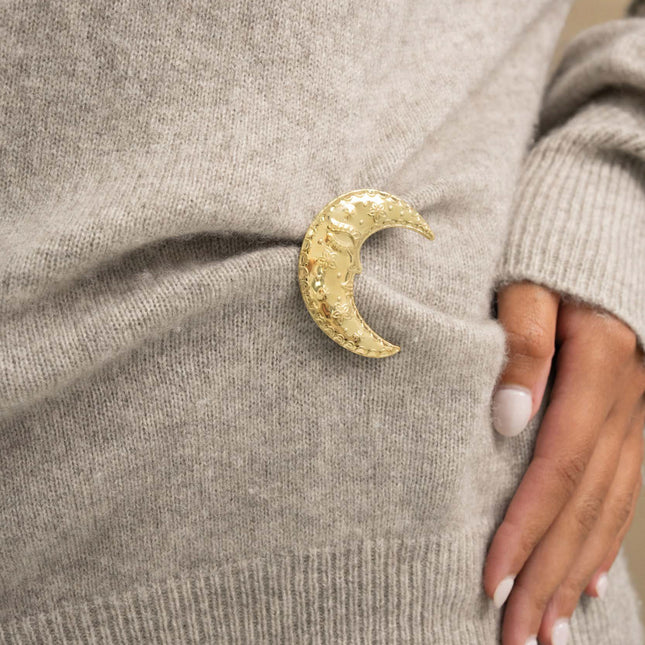 Brooch - crescent moon and small engraved motifs (eye, flowers, dots)