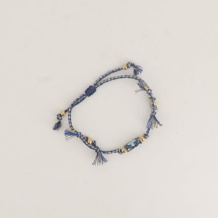 Bracelet sur cordon - perle tube motif floral en émail