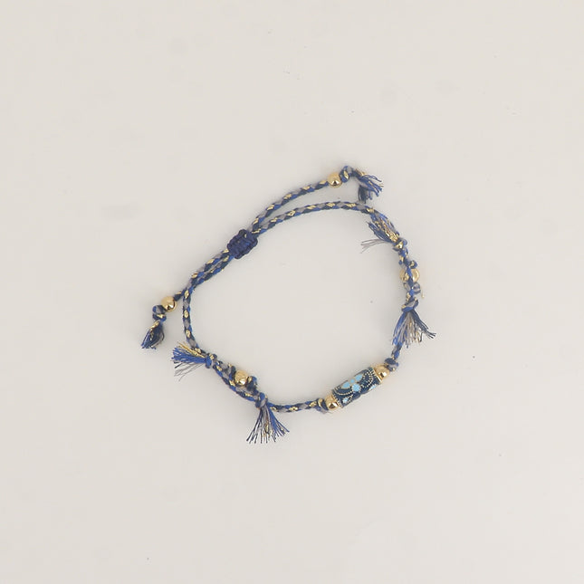 Bracelet sur cordon - perle tube motif floral en émail