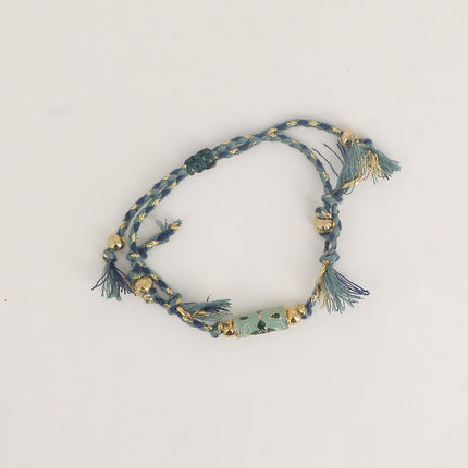 Bracelet sur cordon - perle tube motif floral en émail