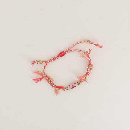 Bracelet sur cordon - perle tube motif floral en émail