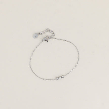 Bracelet - chaîne fine et 3 cristaux ronds