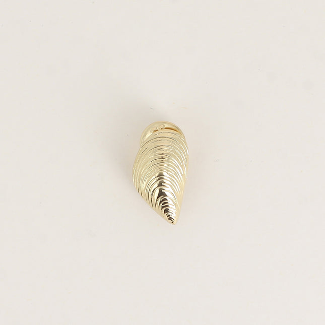 Pin's - coquillage moule texturé